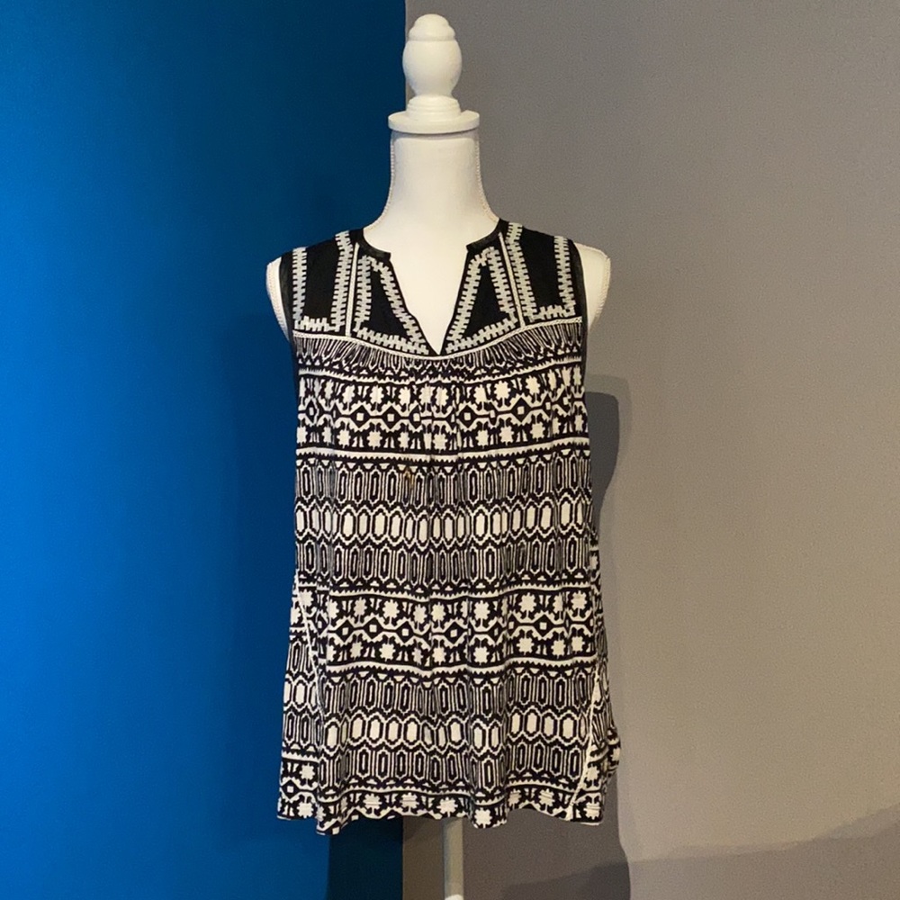 - Anthropologie buy. Black & white longer length top